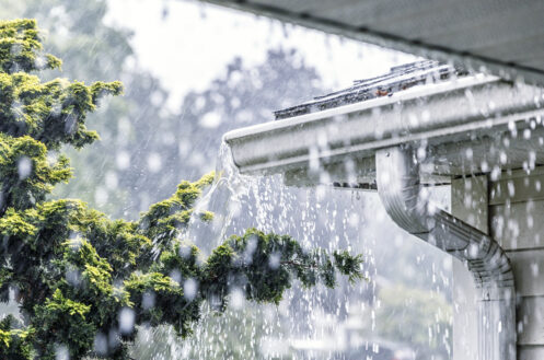 Photo of rain hitting a roof
